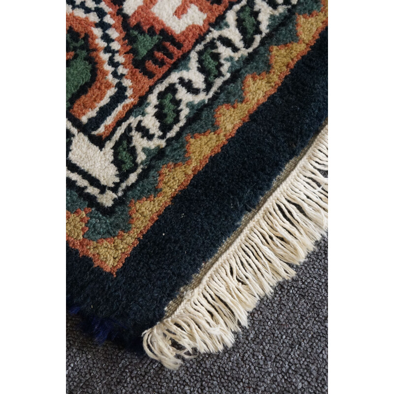 Vintage worn hand-knotted Oriental rug