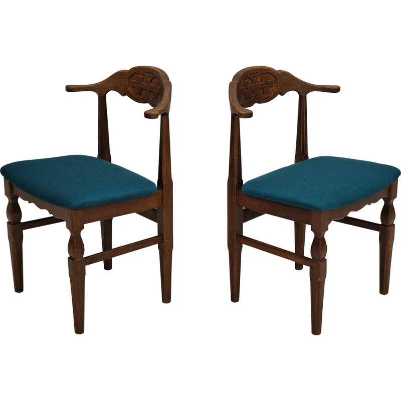 Pair of vintage oakwood and wool chairs by Henning Kjærnulf, Denmark 1960