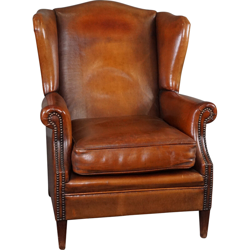 Vintage patinated sheep leather wing armchair