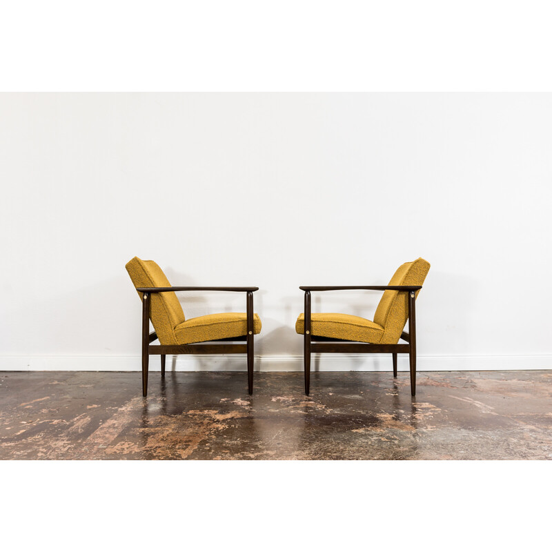 Pair of mid-century yellow bouclé armchairs, Poland 1960s