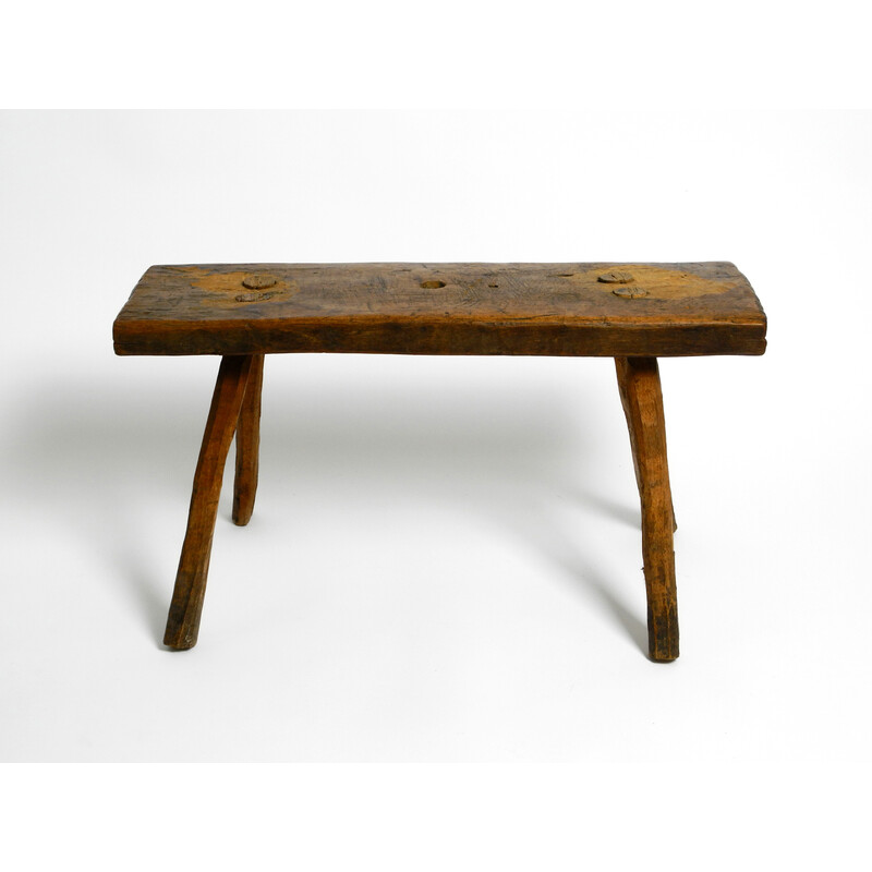 Tabouret vintage oblong à quatre pieds en bois massif