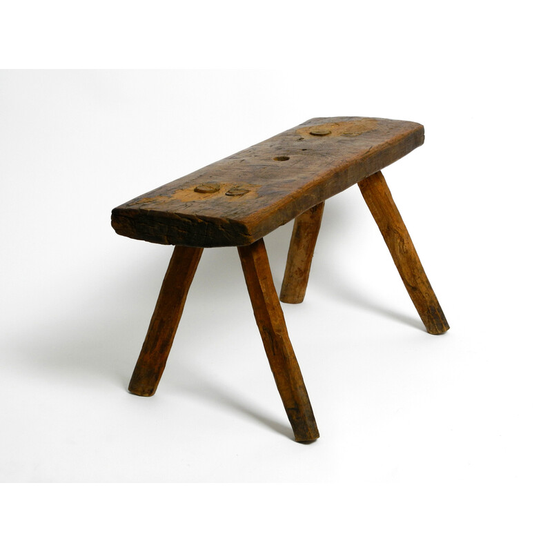 Vintage oblong four-legged solid wood stool