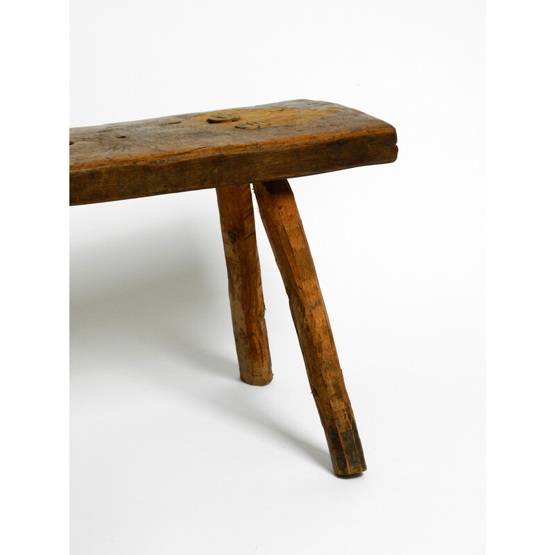 Vintage oblong four-legged solid wood stool