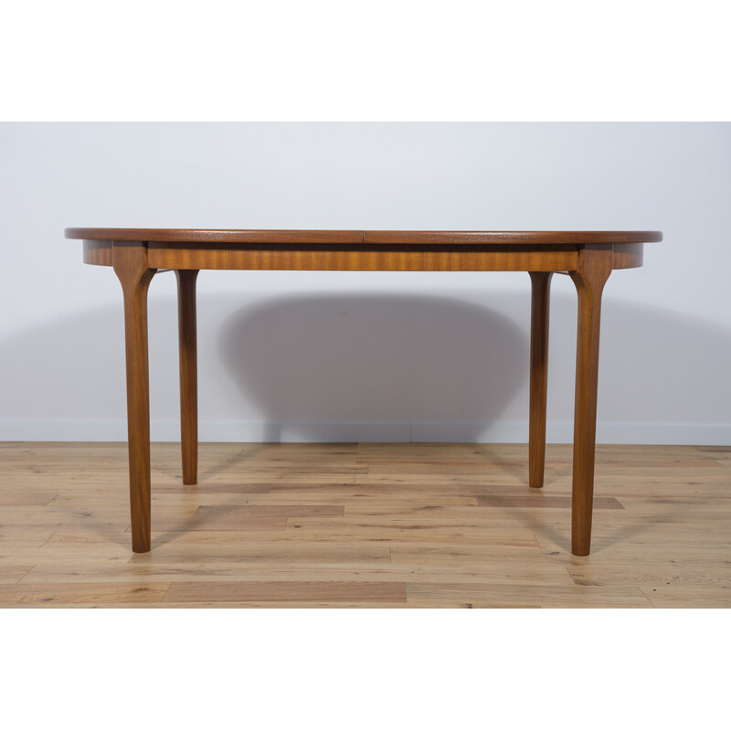 Mesa de comedor extensible ovalada de teca de mediados de siglo, McIntosh, 1960