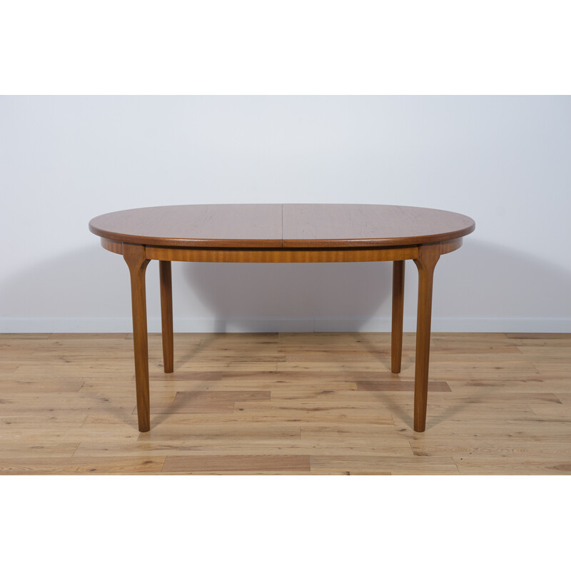 Mesa de comedor extensible ovalada de teca de mediados de siglo, McIntosh, 1960