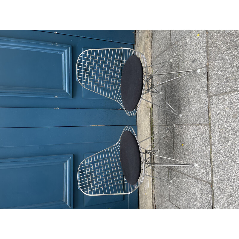 Pair of vintage chromed metal chairs by Charles Eames