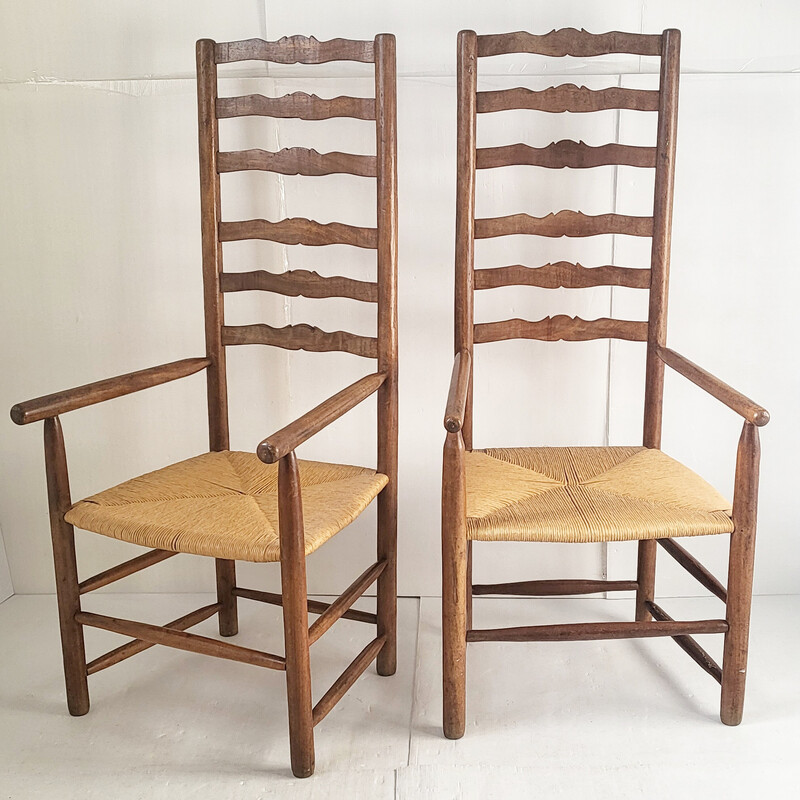 Pair of vintage ladder back armchairs