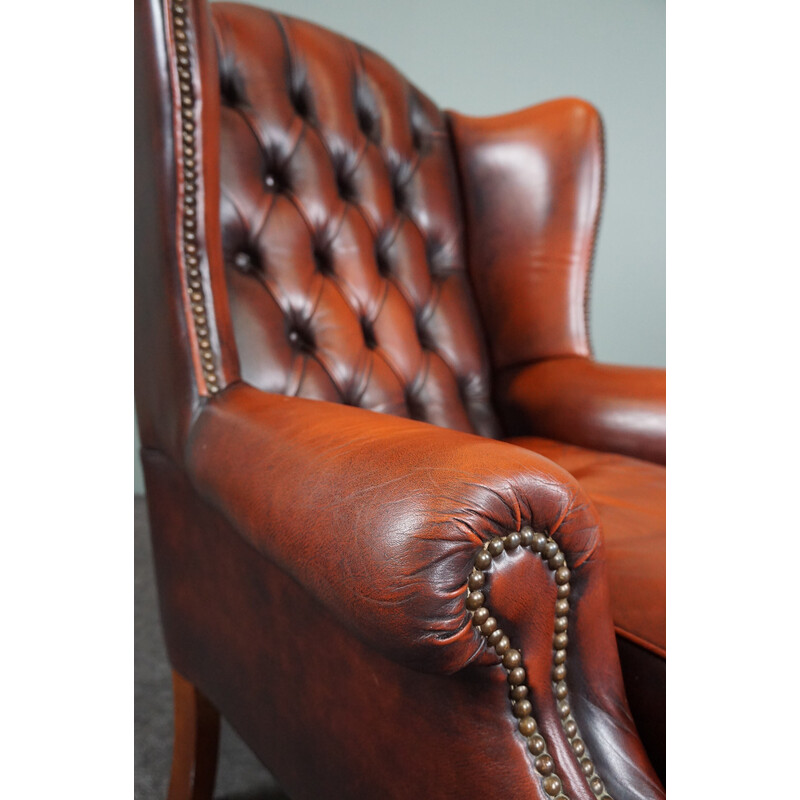 Vintage wing chair "Chesterfield" made of cowhide leather