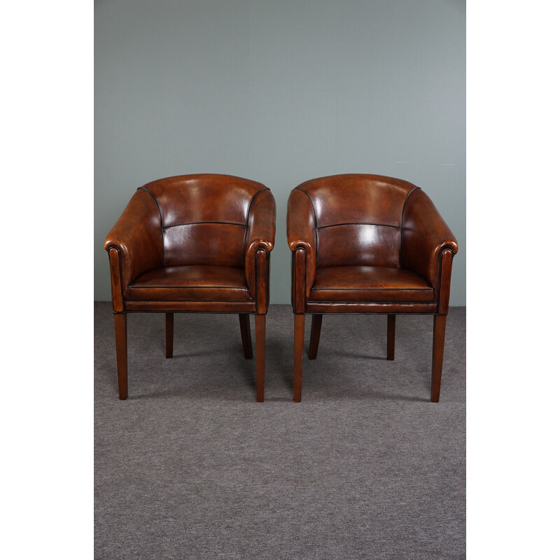 Pair of vintage sheep leather side armchairs