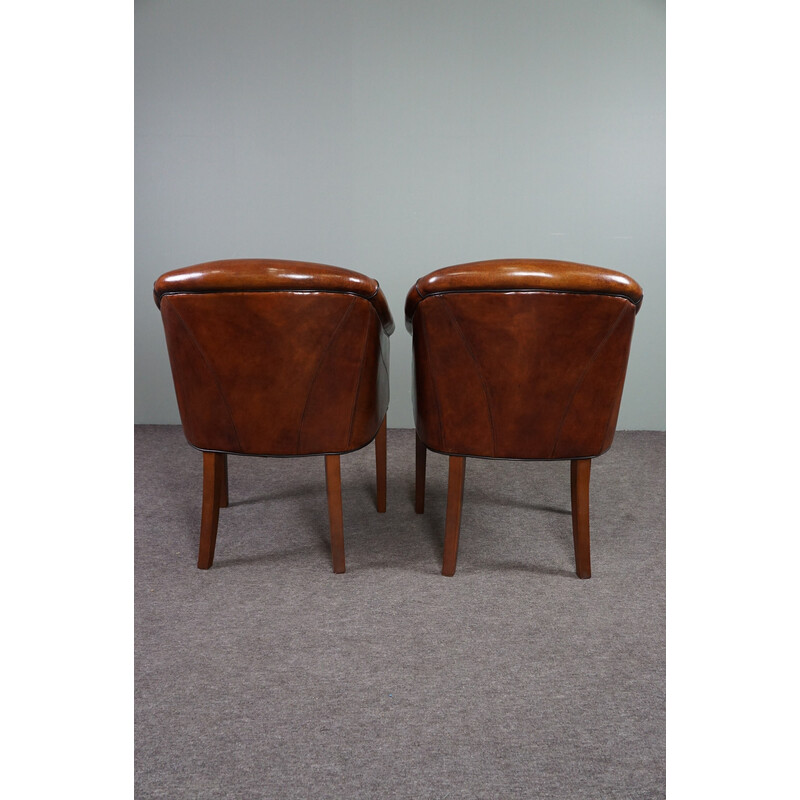 Pair of vintage sheep leather side armchairs
