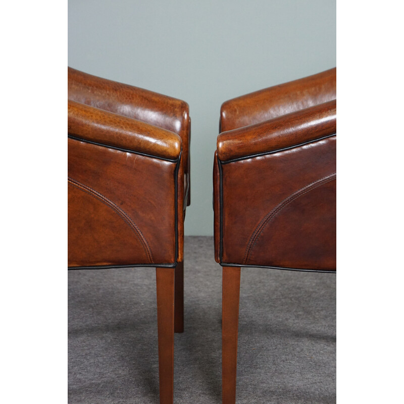 Pair of vintage sheep leather side armchairs