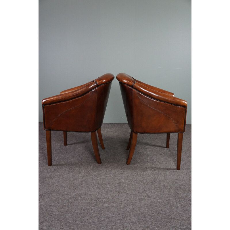 Pair of vintage sheep leather side armchairs