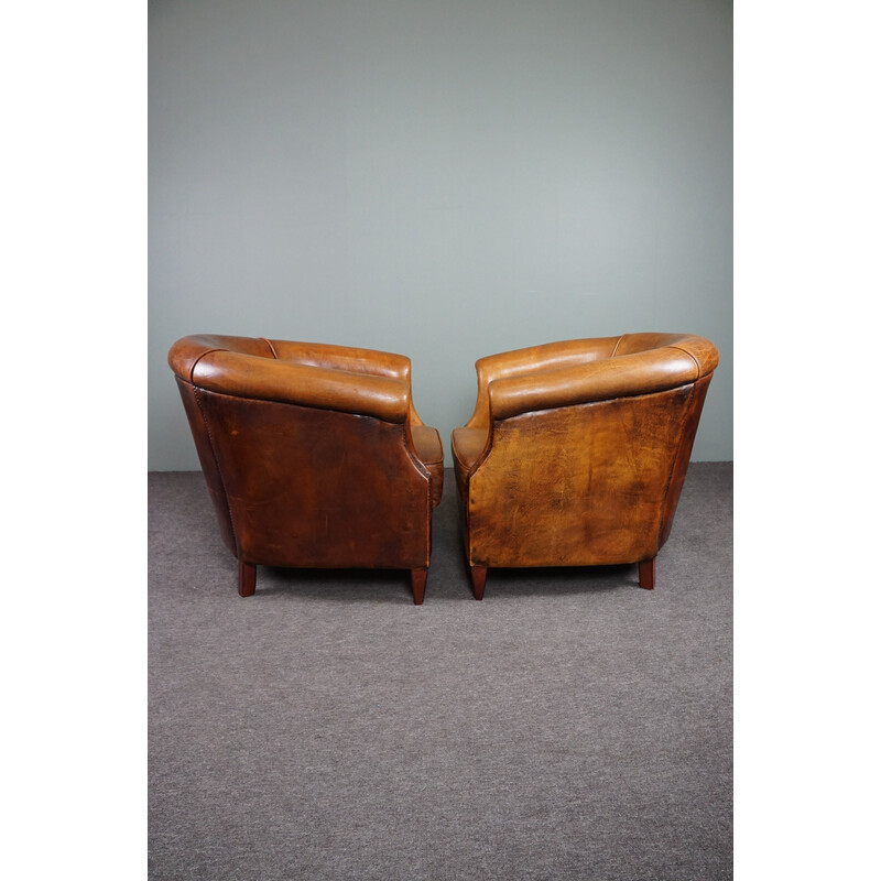 Pair of vintage sheep leather club armchairs