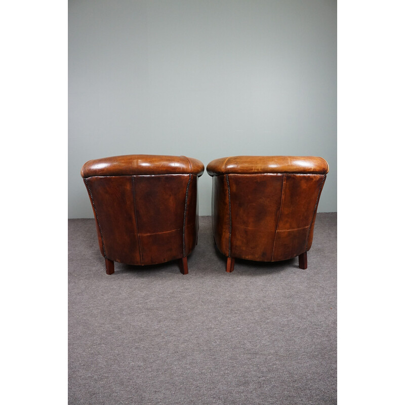 Pair of vintage sheep leather club armchairs