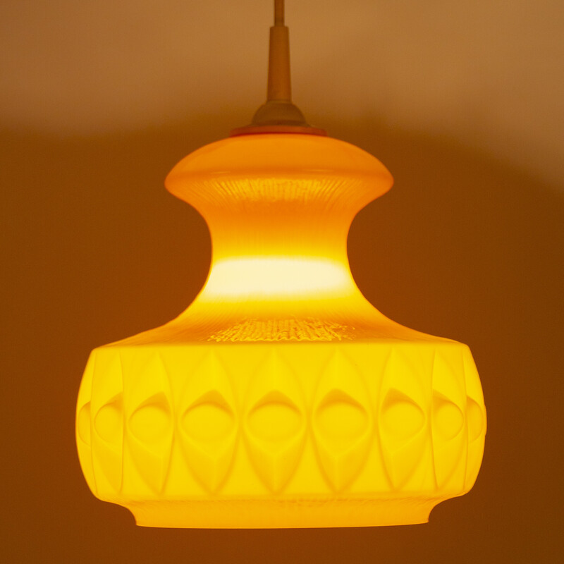 Vintage orange pendant lamp by Peil and Putzler