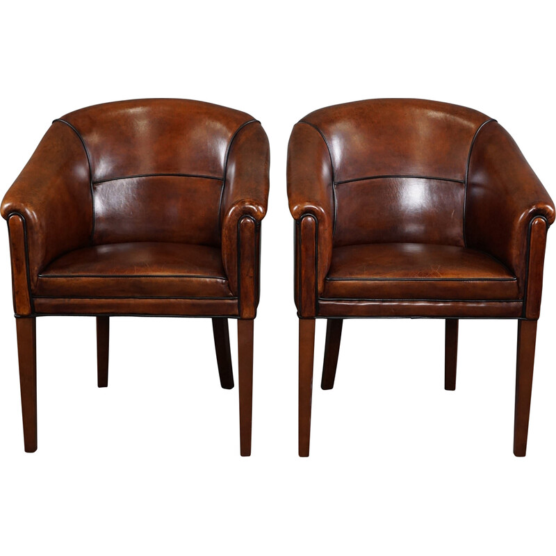 Pair of vintage sheep leather side armchairs