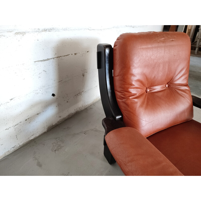 Pair of vintage Brazilian armchairs in black wood and leather