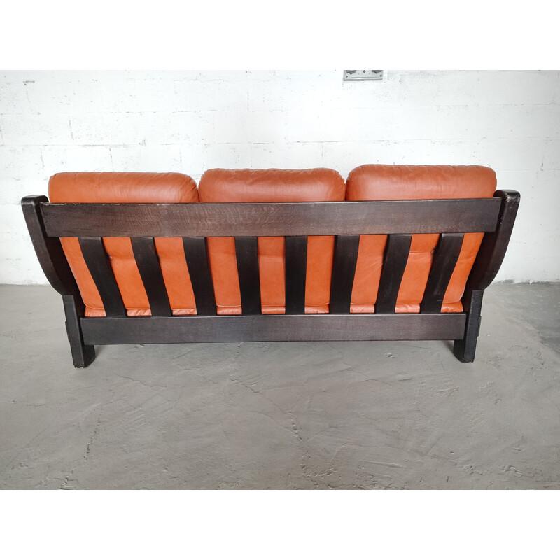Vintage Brazilian sofa in black wood and orange-red leather