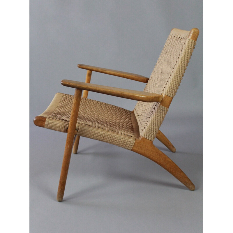 Fauteuil vintage en chêne massif "Ch25" par Hans J Wegner pour Carl Hansen et Son, Danemark 1960