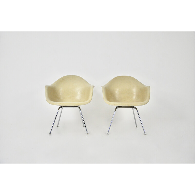 Pair of vintage fiberglass and chrome metal armchairs by Charles and Ray Eames for Herman Miller, 1970