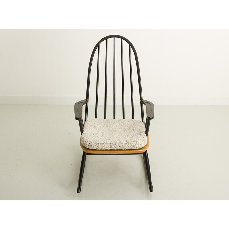 Vintage black rocking chair with fabric cover