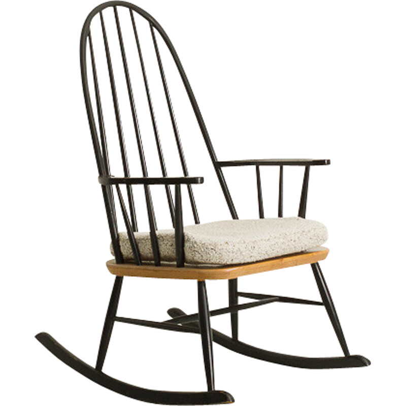 Vintage zwarte schommelstoel met stoffen bekleding