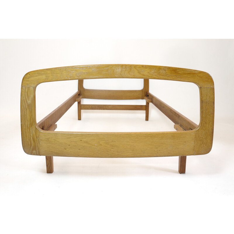 Vintage bed in solid oakwood by Jacques Hauville for Bema, 1950