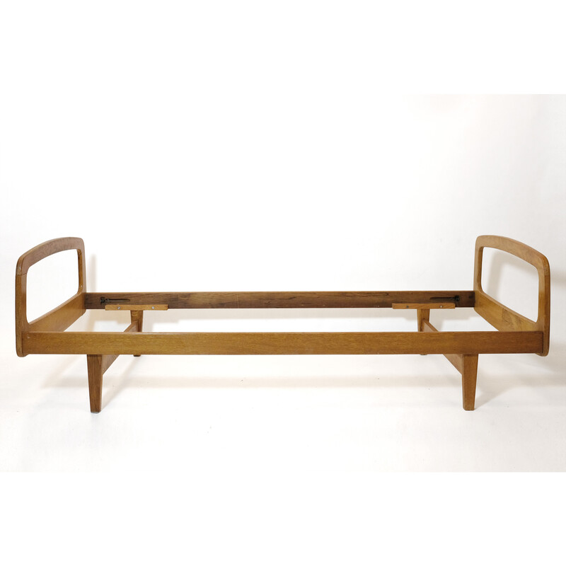 Vintage bed in solid oakwood by Jacques Hauville for Bema, 1950