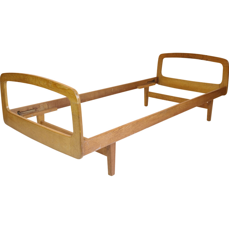 Vintage bed in solid oakwood by Jacques Hauville for Bema, 1950