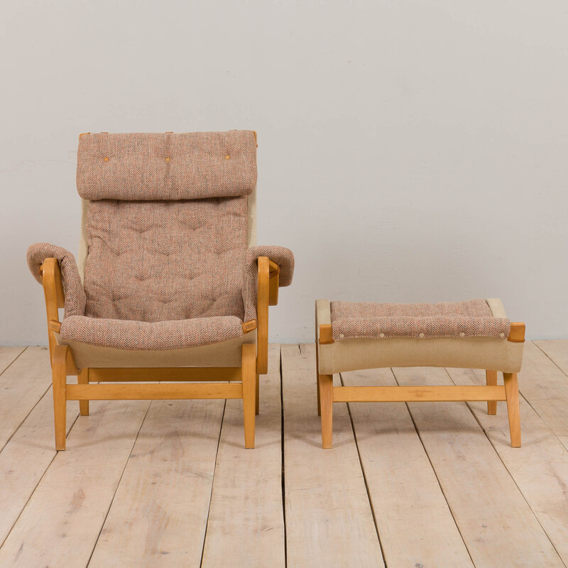 Vintage armchair with footrest Pernilla in curved beech plywood by Bruno Mathsson for Dux, Sweden 1960