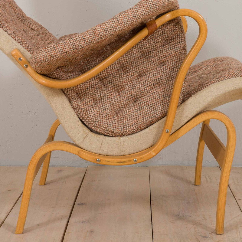 Vintage armchair with footrest Pernilla in curved beech plywood by Bruno Mathsson for Dux, Sweden 1960