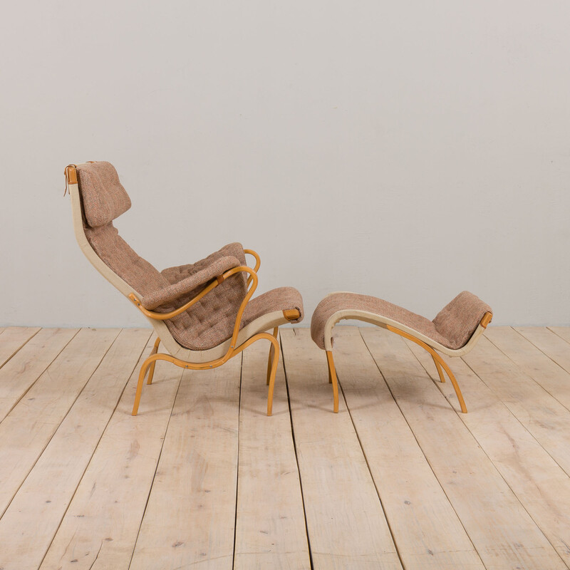 Vintage armchair with footrest Pernilla in curved beech plywood by Bruno Mathsson for Dux, Sweden 1960
