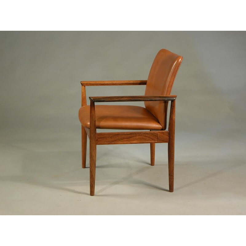 Armchair in rosewood and leather by Finn Juhl for Cado - 1960s