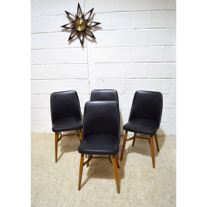 Set of 4 chairs in black vinyl - 1950s