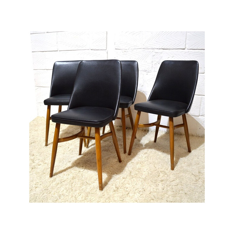 Set of 4 chairs in black vinyl - 1950s