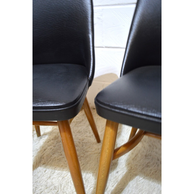 Set of 4 chairs in black vinyl - 1950s