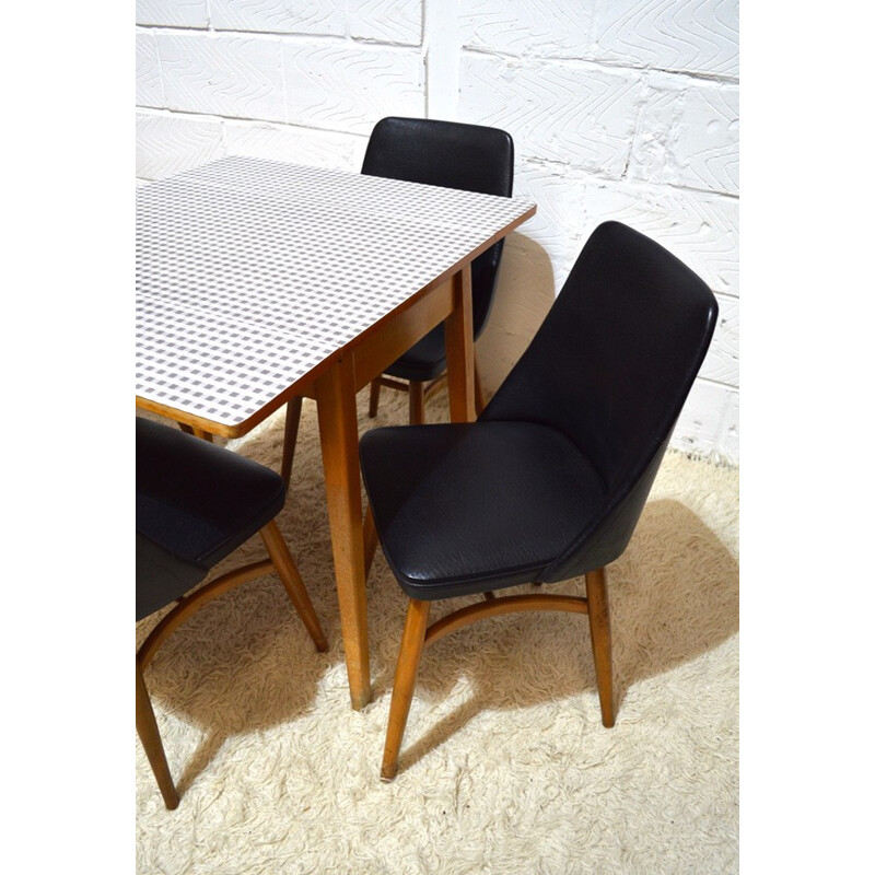 Set of 4 chairs in black vinyl - 1950s