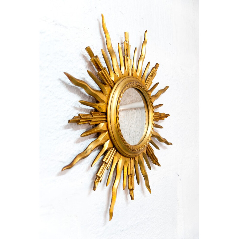 Curved sun mirror with golden frame - 1960s