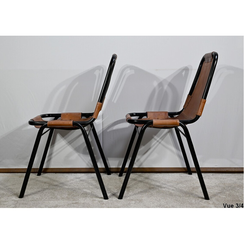 Paar vintage stoelen van metaal en leer, geselecteerd door C. Perriand voor Les Arcs, 1960. Perriand voor Les Arcs, 1960