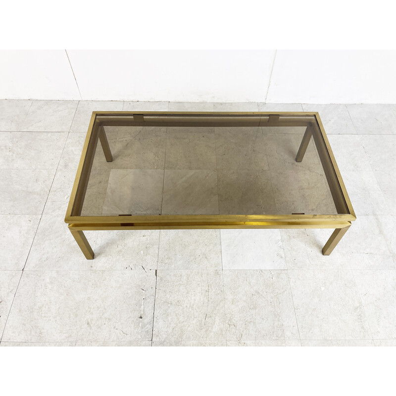 Vintage brass coffee table with smoked glass top by Guy Lefevre for Maison Jansen, France 1970s