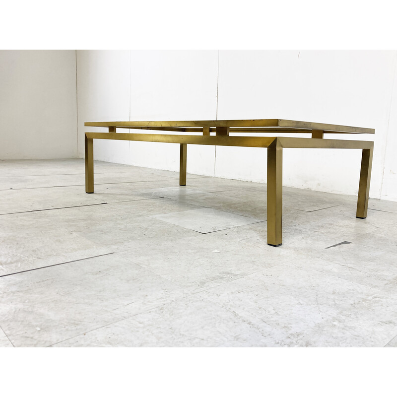 Vintage brass coffee table with smoked glass top by Guy Lefevre for Maison Jansen, France 1970s