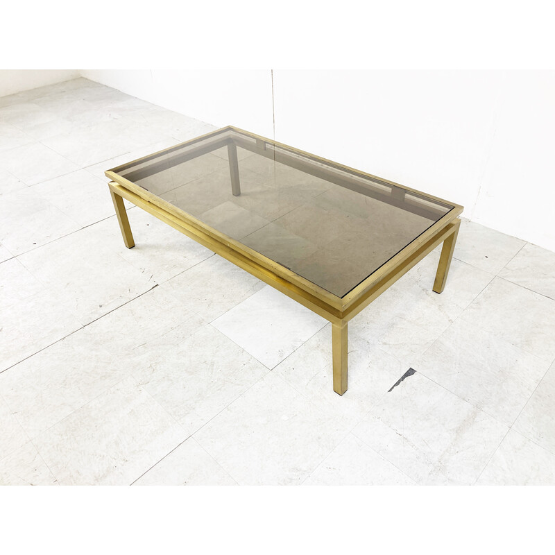 Vintage brass coffee table with smoked glass top by Guy Lefevre for Maison Jansen, France 1970s