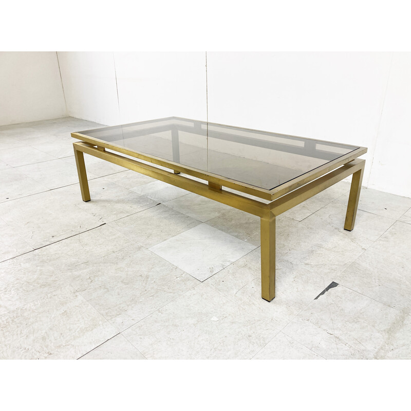 Vintage brass coffee table with smoked glass top by Guy Lefevre for Maison Jansen, France 1970s