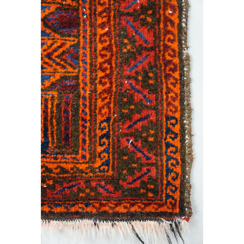 Vintage colorful hand-knotted Oriental rug