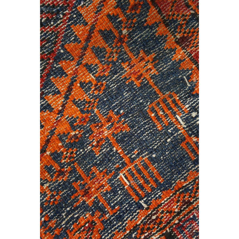 Vintage colorful hand-knotted Oriental rug