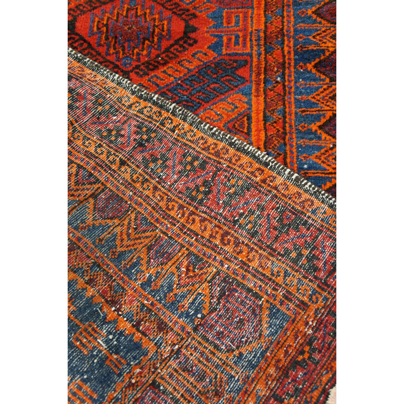 Vintage colorful hand-knotted Oriental rug