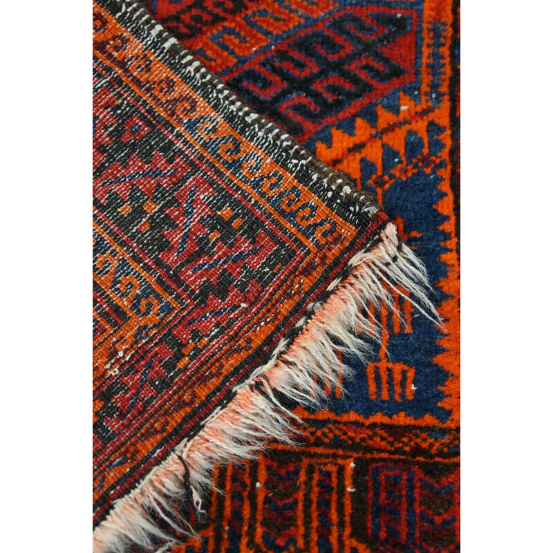 Vintage colorful hand-knotted Oriental rug