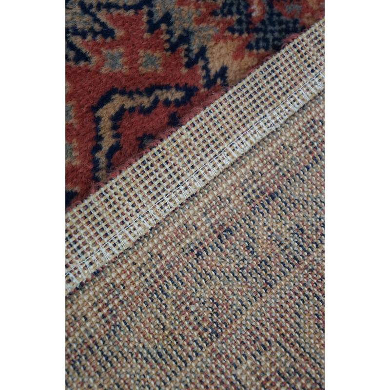 Colorful vintage rug in virgin wool