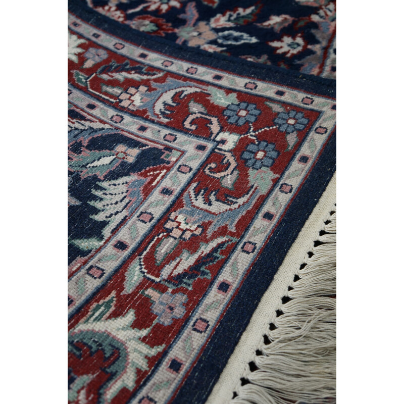 Vintage gekleurd blauw oosters tapijt