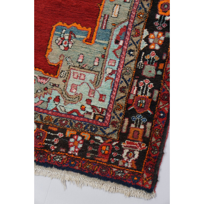 Vintage colorful hand-knotted Persian rug